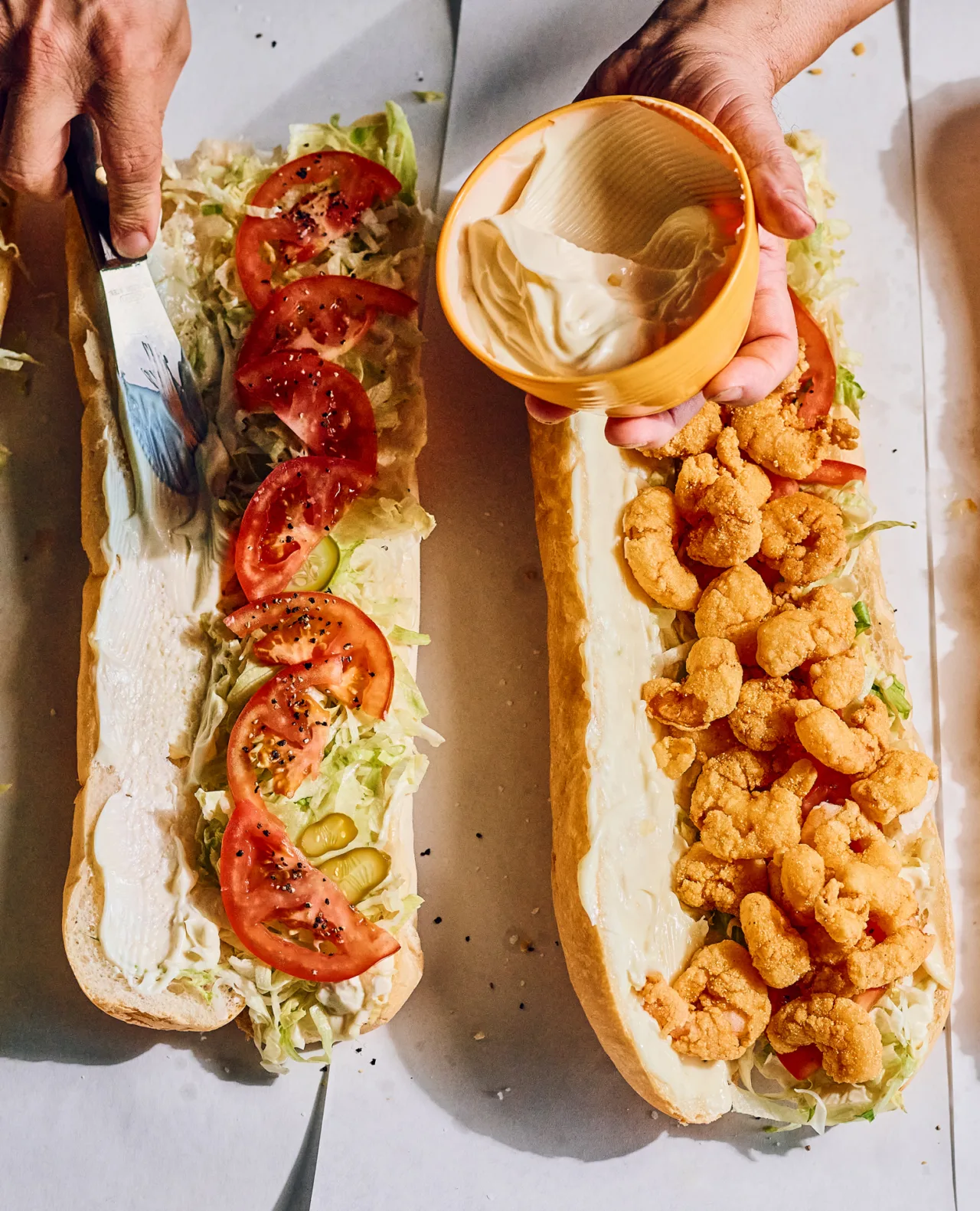 A row of dressed New Orleans po-boys